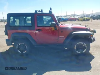 2013 Jeep Wrangler Sport with VIN 1C4AJWAG3DL608342, listed as a IAAI auction lot 41858662 with 118,504 mi miles and . Bid and sale history available at DreamBid. Image 13.