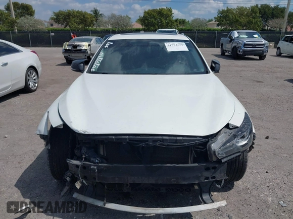 2014 Infiniti Q50 with VIN JN1BV7AP2EM671929, listed as a IAAI auction lot 41794659 with 77,930 mi miles. Bid and sale history available at carsss.com. Image 13.