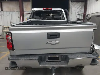 2018 Chevrolet Silverado 1500 LT with VIN 1GCVKREC1JZ151188, listed as a IAAI auction lot 42153618 with 82,391 mi miles and . Bid and sale history available at DreamBid. Image 17.