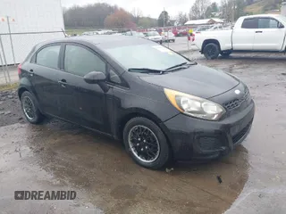2013 Kia Rio LX with VIN KNADM5A35D6224764, listed as a IAAI auction lot 42004548 with 103,582 mi miles. Bid and sale history available at carsss.com. Image 1.
