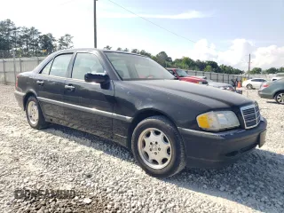 2000 Mercedes-Benz C 230 Kompressor with VIN WDBHA24G4YA839138, listed as a Copart auction lot 54525245 with 227,775 mi miles and Salvage title. Bid and sale history available at DreamBid. Image 4.