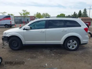 2012 Dodge Journey SXT with VIN 3C4PDCBG4CT372642, listed as a IAAI auction lot 42238499 with 172,033 mi miles and . Bid and sale history available at DreamBid. Image 15.