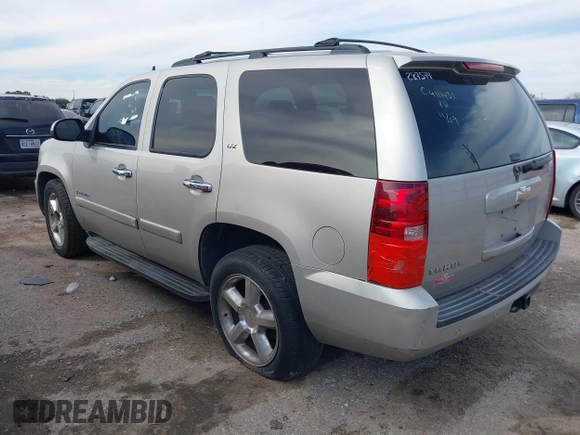 2008 Chevrolet Tahoe LTZ with VIN 1GNFC13JX8R277832, listed as a IAAI auction lot 41348121 with 210,576 mi miles and . Bid and sale history available at DreamBid. Image 3.