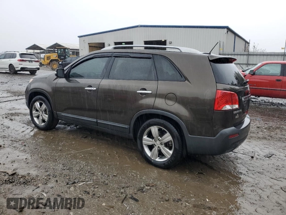 2012 Kia Sorento EX with VIN 5XYKU4A28CG202183, listed as a Copart auction lot 43181465 with 176,890 mi miles and Salvage Title. Bid and sale history available at carsss.com. Image 2.