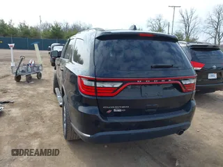 2018 Dodge Durango SXT with VIN 1C4RDJAG4JC434807, listed as a IAAI auction lot 41893271 with 94,447 mi miles and . Bid and sale history available at DreamBid. Image 3.