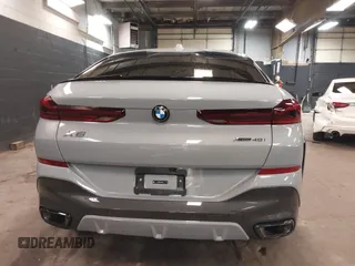 2025 BMW X6 xDrive40i with VIN 5UX33EX04S9Z44291, listed as a IAAI auction lot 41827897 with 1,053 mi miles. Bid and sale history available at carsss.com. Image 16.