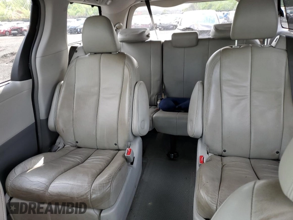 2014 Toyota Sienna Limited z VIN 5TDDK3DC5ES086024, wystawiony jako Copart lot #56299555 z przebiegiem 136 876 mil mil oraz Szkoda całkowita • Salvage title. Historia ofert i sprzedaży dostępna na DreamBid. Obrazek 10.