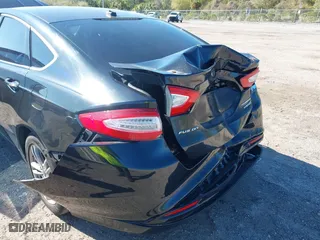 2015 Ford Fusion Titanium Hybrid with VIN 3FA6P0RUXFR119698, listed as a IAAI auction lot 41791411 with 140,646 mi miles. Bid and sale history available at carsss.com. Image 12.