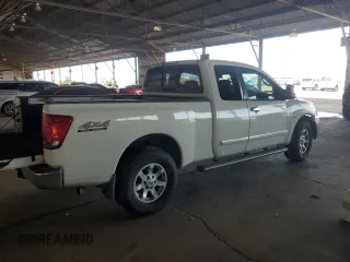 2004 Nissan Titan SE with VIN 1N6AA06B84N577326, listed as a Copart auction lot 59724355 with 179,549 mi miles and Salvage title. Bid and sale history available at DreamBid. Image 3.