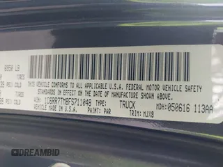 2015 Ram 1500 Big Horn z VIN 1C6RR7TM8FS711048, wystawiony jako IAAI lot #41760186 z przebiegiem Nie podano mil oraz . Historia ofert i sprzedaży dostępna na DreamBid. Obrazek 9.