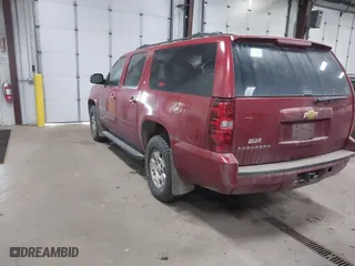 2013 Chevrolet Suburban LT with VIN 1GNSKJE76DR222890, listed as a IAAI auction lot 41698835 with 288,835 mi miles. Bid and sale history available at carsss.com. Image 3.