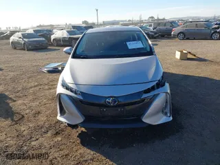 2021 Toyota Prius Prime LE with VIN JTDKAMFP1M3178179, listed as a IAAI auction lot 41233411 with 83,035 mi miles. Bid and sale history available at carsss.com. Image 13.