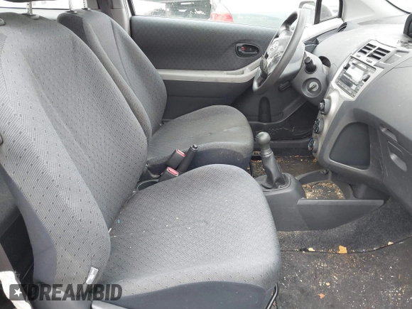 2009 Toyota Yaris with VIN JTDJT903595224746, listed as a IAAI auction lot 42217189 with 183,363 mi miles. Bid and sale history available at carsss.com. Image 5.