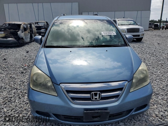 2007 Honda Odyssey EX with VIN 5FNRL38457B052131, listed as a Copart auction lot 55226575 with 165,745 mi miles and Salvage Title. Bid and sale history available at DreamBid. Image 5.