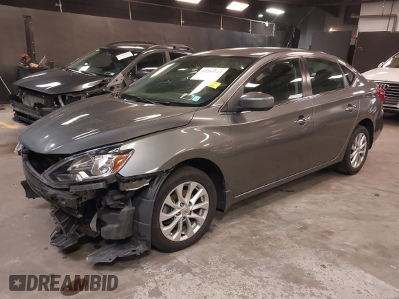 2019 Nissan Sentra S z VIN 3N1AB7AP3KY368736, wystawiony jako IAAI lot #42283123 z przebiegiem 89 117 mil mil oraz . Historia ofert i sprzedaży dostępna na DreamBid. Obrazek 2.