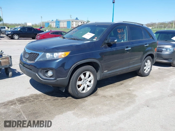2013 Kia Sorento LX with VIN 5XYKTCA6XDG345234, listed as a IAAI auction lot 42047737 with 138,496 mi miles. Bid and sale history available at carsss.com. Image 2.