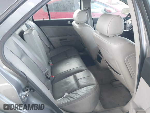 2005 Cadillac STS z VIN 1G6DW677X50185643, wystawiony jako IAAI lot #41730111 z przebiegiem 218 764 mil mil oraz . Historia ofert i sprzedaży dostępna na DreamBid. Obrazek 8.