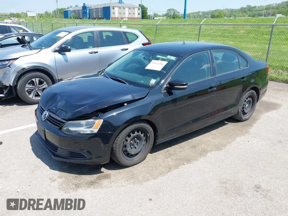 2012 Volkswagen Jetta Sedan SE w/Convenience & Sunroof with VIN 3VWDX7AJ4CM107290, listed as a IAAI auction lot 42142201 with 132,122 mi miles. Bid and sale history available at carsss.com. Image 2.