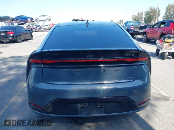 2023 Toyota Prius LE z VIN JTDADABU6P3001399, wystawiony jako IAAI lot #42137395 z przebiegiem 37 716 mil mil oraz . Historia ofert i sprzedaży dostępna na DreamBid. Obrazek 16.