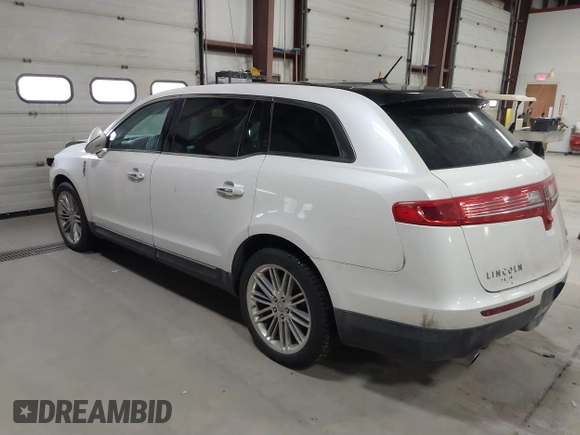2013 Lincoln MKT EcoBoost with VIN 2LMHJ5AT3DBL56954, listed as a IAAI auction lot 41705877 with 148,771 mi miles. Bid and sale history available at carsss.com. Image 3.