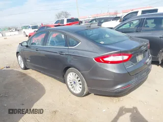 2016 Ford Fusion SE Hybrid with VIN 3FA6P0LU7GR218781, listed as a IAAI auction lot 41844791 with 214,867 mi miles. Bid and sale history available at carsss.com. Image 3.