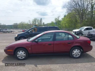 2001 Saturn SL z VIN 1G8ZH52841Z331770, wystawiony jako IAAI lot #42136194 z przebiegiem 70 798 mil mil oraz . Historia ofert i sprzedaży dostępna na DreamBid. Obrazek 14.
