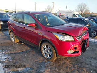 2015 Ford Escape Titanium with VIN 1FMCU9J99FUB34831, listed as a IAAI auction lot 41278305 with 59,658 mi miles and . Bid and sale history available at DreamBid. Image 1.