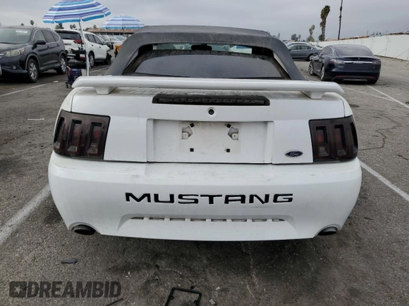 2004 Ford Mustang Deluxe z VIN 1FAFP44454F123067, wystawiony jako Copart lot #86784474 z przebiegiem 161 541 mil mil oraz Szkoda całkowita • Salvage title. Historia ofert i sprzedaży dostępna na DreamBid. Obrazek 6.
