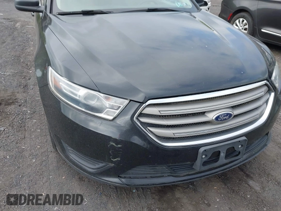 2014 Ford Taurus SE z VIN 1FAHP2D87EG165025, wystawiony jako IAAI lot #42226401 z przebiegiem 209 411 mil mil oraz . Historia ofert i sprzedaży dostępna na DreamBid. Obrazek 6.