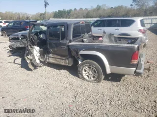 2002 Dodge Dakota SLT with VIN 1B7HL48NX2S512339, listed as a Copart auction lot 50911075 with 0 mi miles and Salvage Title. Bid and sale history available at carsss.com. Image 2.