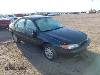 1998 Ford Escort SE with VIN 1FAFP13P3WW192028, listed as a IAAI auction lot 41754237 with 140,000 mi miles. Bid and sale history available at carsss.com. Image 1.