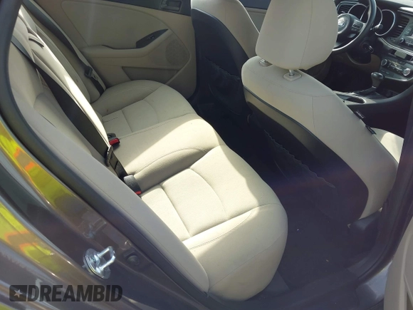 2015 Kia Optima LX with VIN 5XXGM4A77FG403664, listed as a IAAI auction lot 42471658 with 76,352 mi miles and . Bid and sale history available at DreamBid. Image 8.