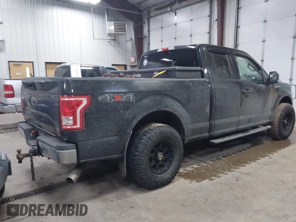 2015 Ford F-150 XLT with VIN 1FTFX1EF9FFB74356, listed as a IAAI auction lot 41443778 with 168,086 mi miles. Bid and sale history available at carsss.com. Image 4.