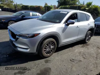 2021 Mazda CX-5 Touring z VIN JM3KFBCM2M1500752, wystawiony jako Copart lot #60697475 z przebiegiem 40 633 mil mil oraz Szkoda całkowita • Salvage title. Historia ofert i sprzedaży dostępna na DreamBid. Obrazek 1.