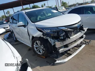 2024 Toyota Sienna XLE with VIN 5TDJSKFC0RS151037, listed as a IAAI auction lot 42562211 with 14,103 mi miles and . Bid and sale history available at DreamBid. Image 1.