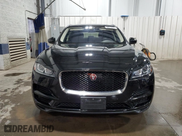 2019 Jaguar F-Pace 25t Prestige with VIN SADCK2FX0KA352021, listed as a Copart auction lot 50015475 with 69,786 mi miles and Salvage Title. Bid and sale history available at DreamBid. Image 5.