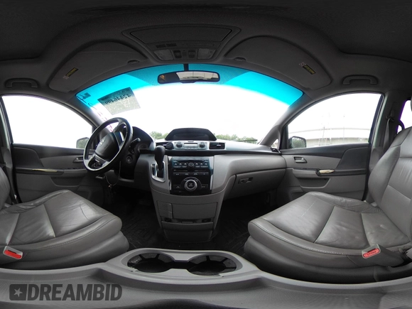 2012 Honda Odyssey EX-L with VIN 5FNRL5H66CB095996, listed as a IAAI auction lot 42446499 with 198,016 mi miles and . Bid and sale history available at DreamBid. Image 18.