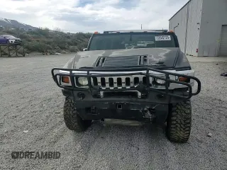 2004 Hummer H2 z VIN 5GRGN23U74H100175, wystawiony jako Copart lot #52642125 z przebiegiem 112 305 mil mil oraz Szkoda całkowita • Salvage title. Historia ofert i sprzedaży dostępna na DreamBid. Obrazek 12.