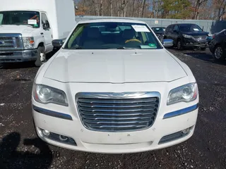 2013 Chrysler 300 with VIN 2C3CCAKGXDH733148, listed as a IAAI auction lot 41541442 with 216,074 mi miles. Bid and sale history available at carsss.com. Image 12.