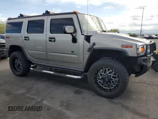 2005 Hummer H2 SUV z VIN 5GRGN23U65H106597, wystawiony jako Copart lot #54508345 z przebiegiem Nie podano mil oraz Szkoda całkowita • Salvage title. Historia ofert i sprzedaży dostępna na DreamBid. Obrazek 4.