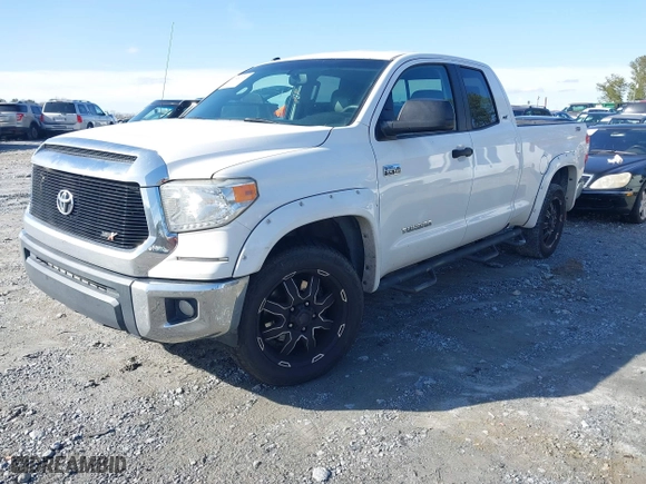 2014 Toyota Tundra 4WD Truck SR with VIN 5TFUW5F1XEX370559, listed as a IAAI auction lot 41587074 with 176,057 mi miles. Bid and sale history available at carsss.com. Image 18.