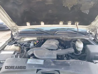 2005 Cadillac Escalade z VIN 1GYEC63T55R115387, wystawiony jako IAAI lot #41791855 z przebiegiem 165 246 mil mil oraz . Historia ofert i sprzedaży dostępna na DreamBid. Obrazek 10.