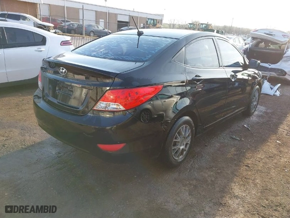 2012 Hyundai Accent GLS with VIN KMHCT4AE3CU223311, listed as a IAAI auction lot 41866880 with 121,701 mi miles. Bid and sale history available at carsss.com. Image 4.