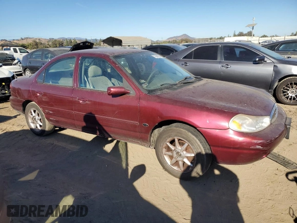 1998 Ford Contour SE z VIN 1FAFP6639WK279655, wystawiony jako Copart lot #77660774 z przebiegiem 89 161 mil mil oraz Szkoda całkowita • Salvage title. Historia ofert i sprzedaży dostępna na DreamBid. Obrazek 4.
