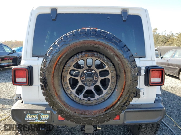 2022 Jeep Wrangler Unlimited Rubicon with VIN 1C4JJXFG2NW125360, listed as a Copart auction lot 76773624 with 22,978 mi miles and Salvage title. Bid and sale history available at DreamBid. Image 6.