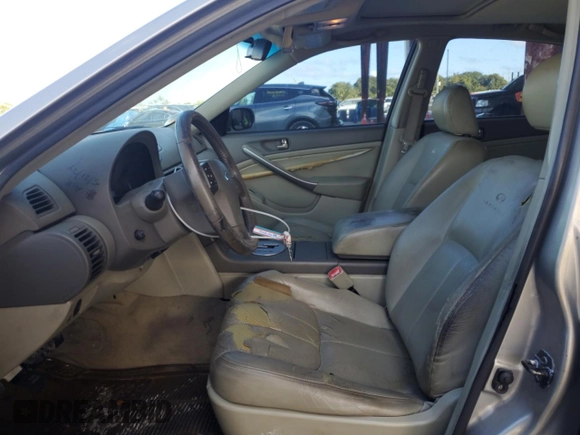 2003 Infiniti G35 w/Leather with VIN JNKCV51E53M317323, listed as a Copart auction lot 44179645 with 192,228 mi miles and Salvage Title. Bid and sale history available at carsss.com. Image 7.