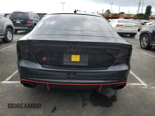 2016 Audi RS 7 Prestige z VIN WUAW2AFC4GN901559, wystawiony jako Copart lot #43982414 z przebiegiem 54 386 mil mil oraz . Historia ofert i sprzedaży dostępna na DreamBid. Obrazek 6.