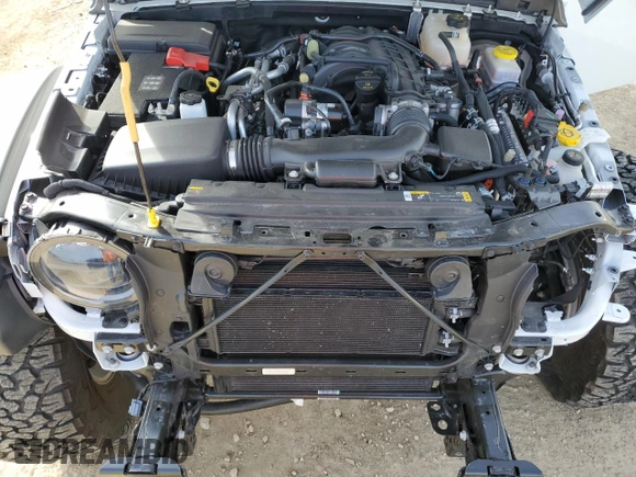 2023 Jeep Wrangler Sport S with VIN 1C4HJXDGXPW665818, listed as a Copart auction lot 48357105 with 9,803 mi miles and Clean Title. Bid and sale history available at DreamBid. Image 12.