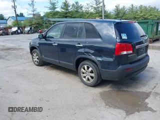 2013 Kia Sorento LX with VIN 5XYKTCA60DG403769, listed as a IAAI auction lot 42265980 with 215,013 mi miles and . Bid and sale history available at DreamBid. Image 3.