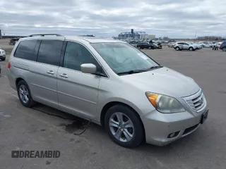 2008 Honda Odyssey Touring with VIN 5FNRL38928B109012, listed as a IAAI auction lot 41922712 with 241,589 mi miles. Bid and sale history available at carsss.com. Image 1.